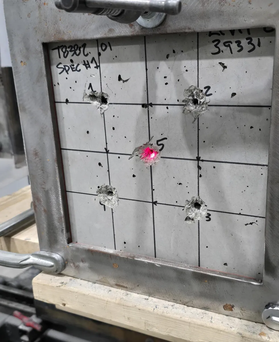 Finished UL-RF-H test panel with five 7.62x51mm NATO impacts, none through
