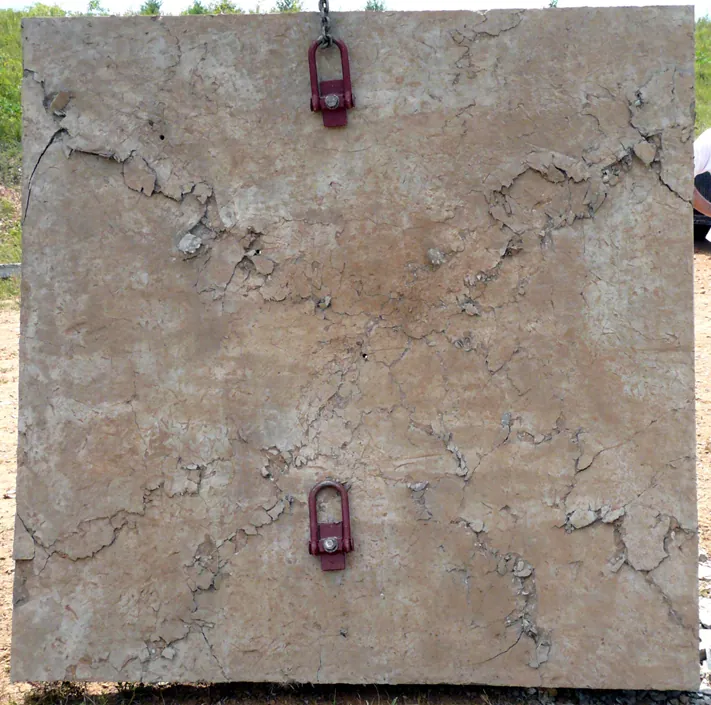 Identical panel with Echo Cast Technology, no rear-face spall after 75 lb TNT